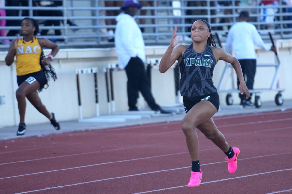 Freshman Rionna Martin sprints to the finish in the 100m dash at the District Championships. She advanced to Area in the 100m, 200m and in the 4x100.