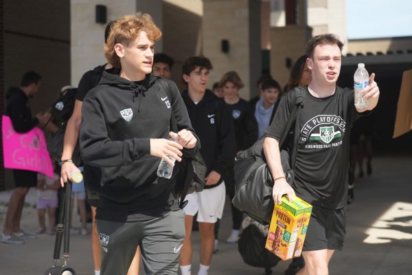 Junior Jonny West and senior Craig Potter walk to the charter bus on their way to the Area playoffs against Lucas Lovejoy. The Panthers won 4-0.  
