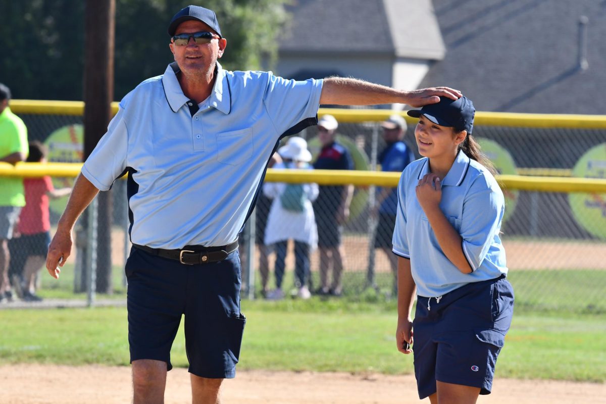 KGSA umpire Doug Haley jokes with Maya Ortiz during her first game umping at KGSA in 2021 on the 8U fields. Haley first met Maya when she was playing softball at age 9. 