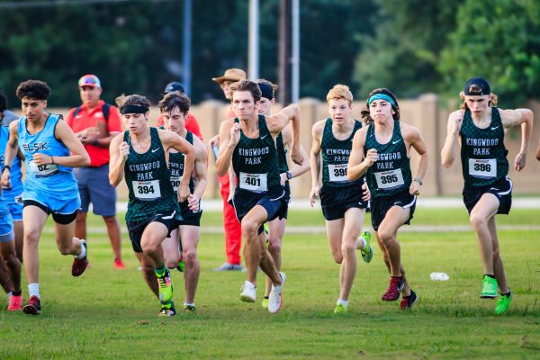 The varsity boys push off the line after the starting gun is fired at the Pearland cross country meet in August.