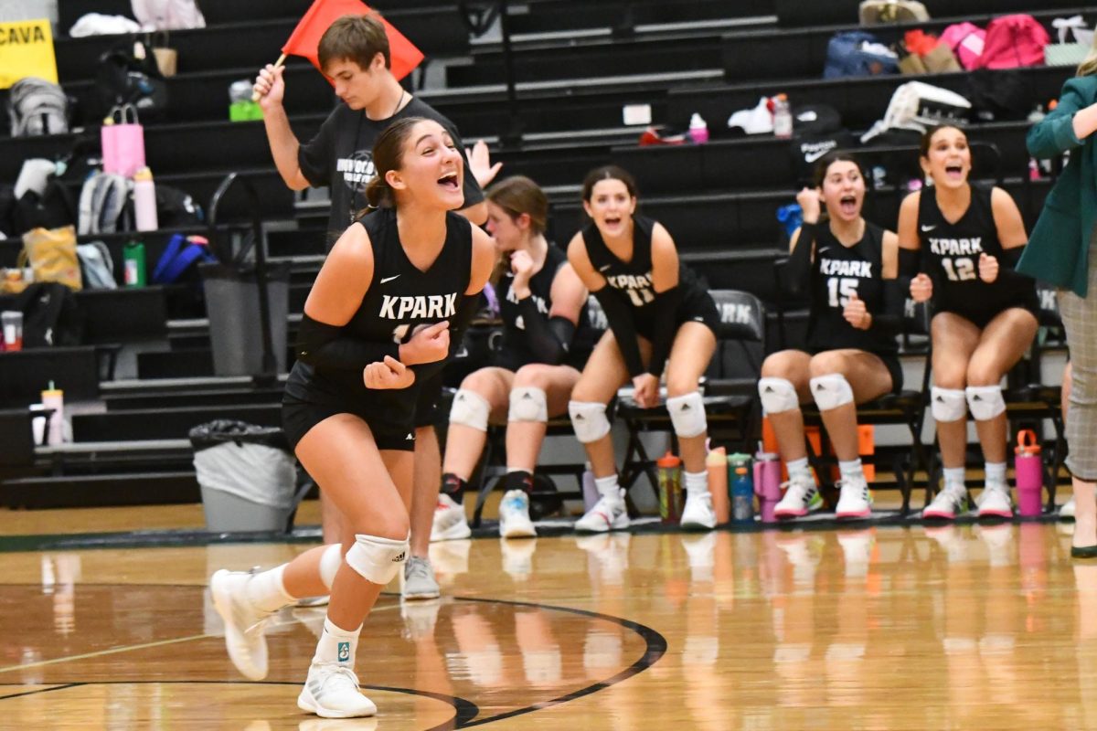 Senior Emily Pavel celebrates after getting an ace against Lake Creek during their first home game.