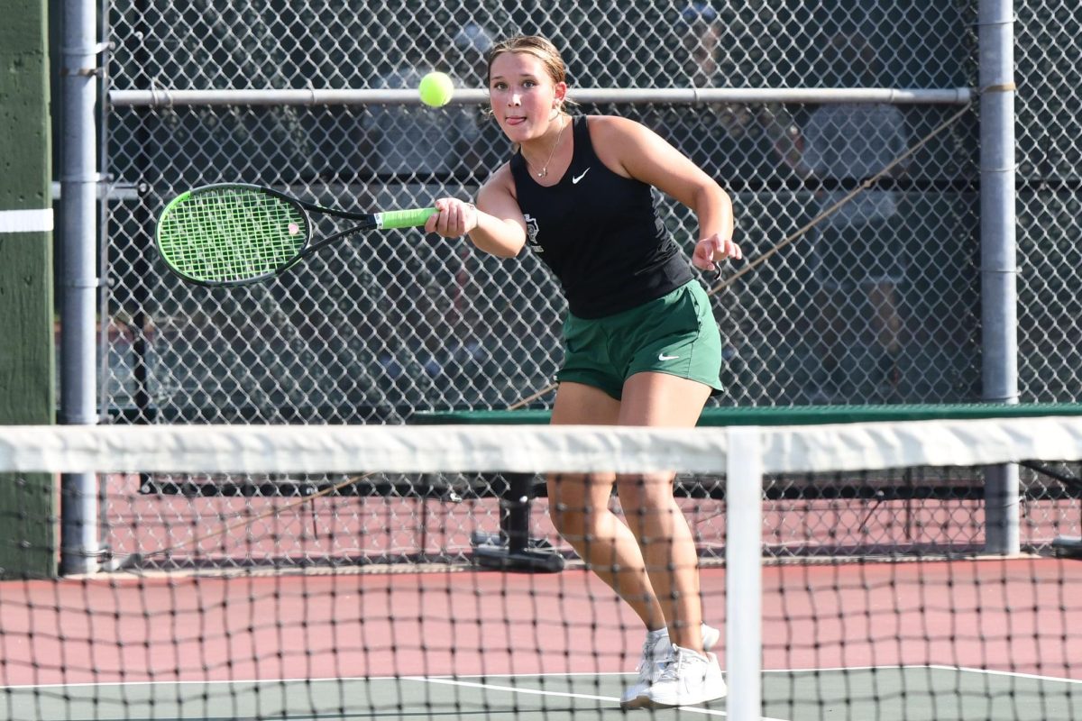 Junior Alina Prestwood returns a volley during team's match against Goose Creek Memorial.