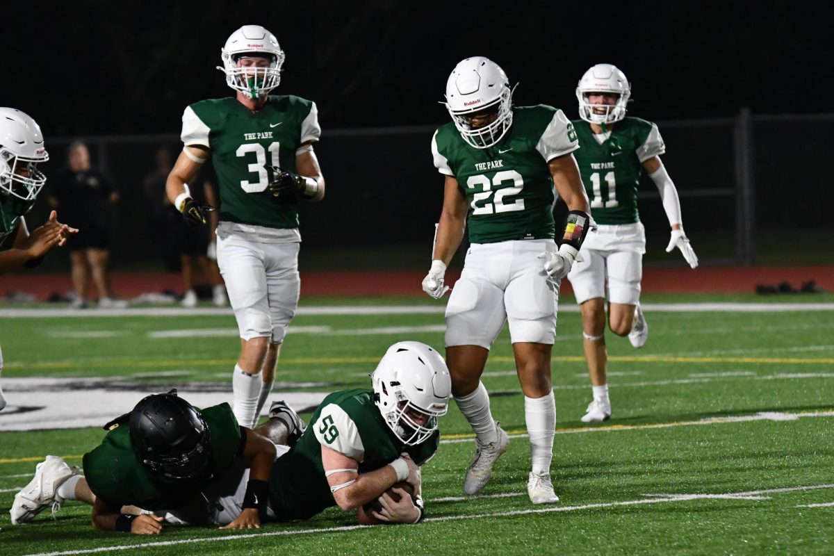 Senior Tristan Viso celebrates teammate Lachlan Timpanaro during their last scrimmage against Galena Park. 