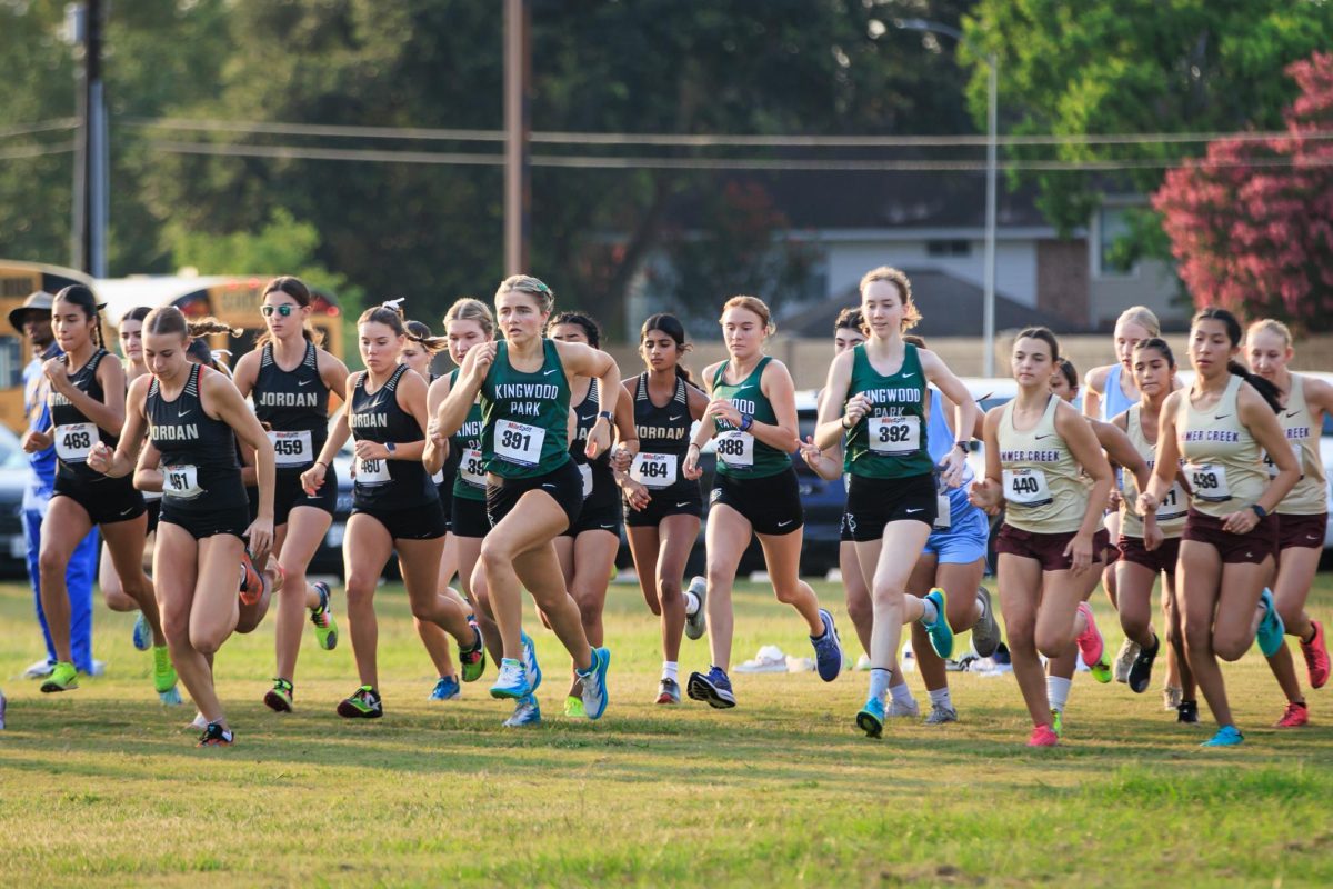 At the starting line, seniors Lucy Foltz and Sophia Sullivan lead the Panthers at the sound of the gun. Photo courtesy of Tim Sullivan.