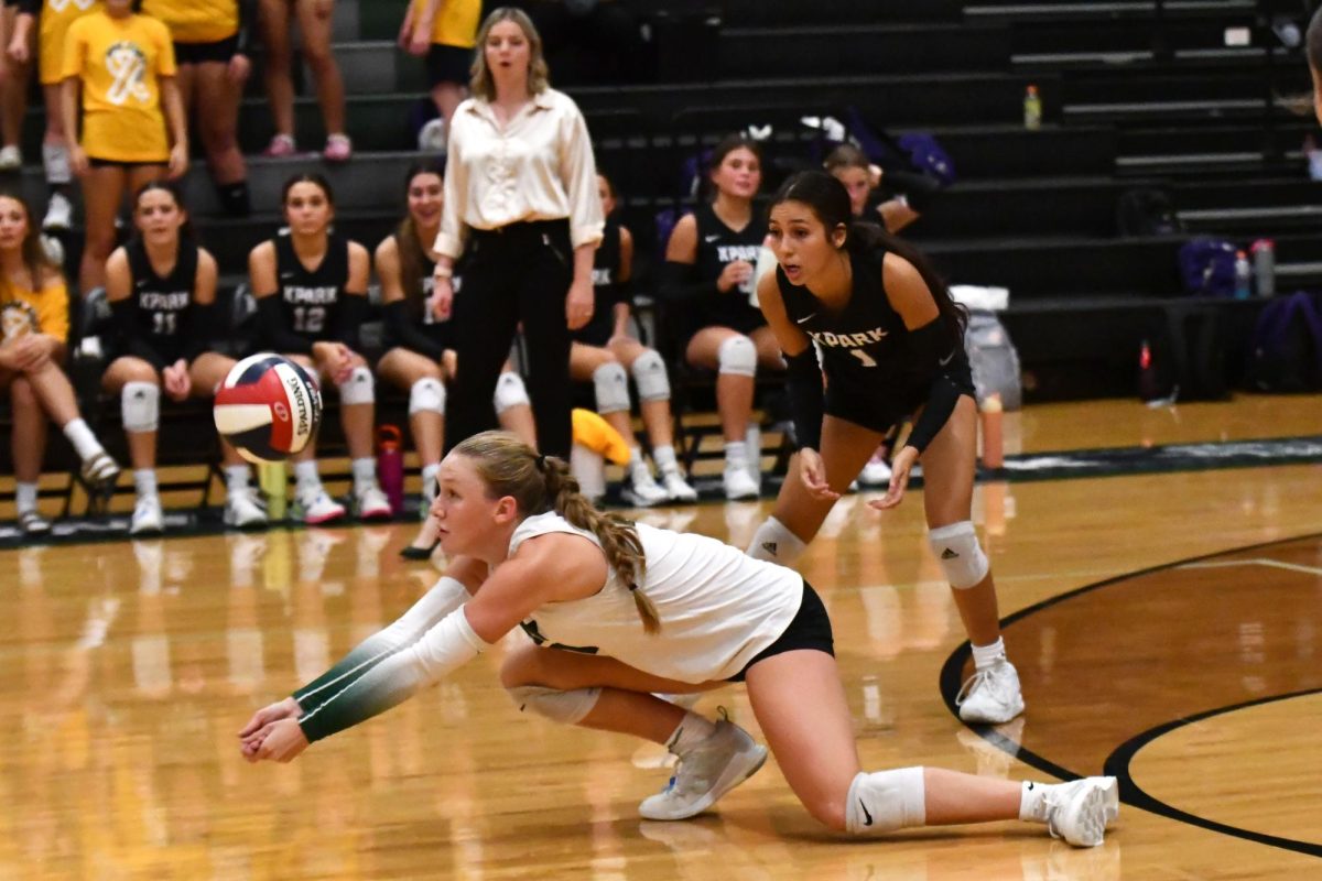 Senior Krisslyn Boyles lunges forward to pass the ball to the setter against Montgomery on Sept. 10.