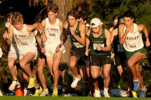 Seniors Elijah Merino and Carson Brown jump off the line at the sound of the gun during the Nike South Meet in The Woodlands. The two always line up together with Brown helping Merino set the pace in the races. 