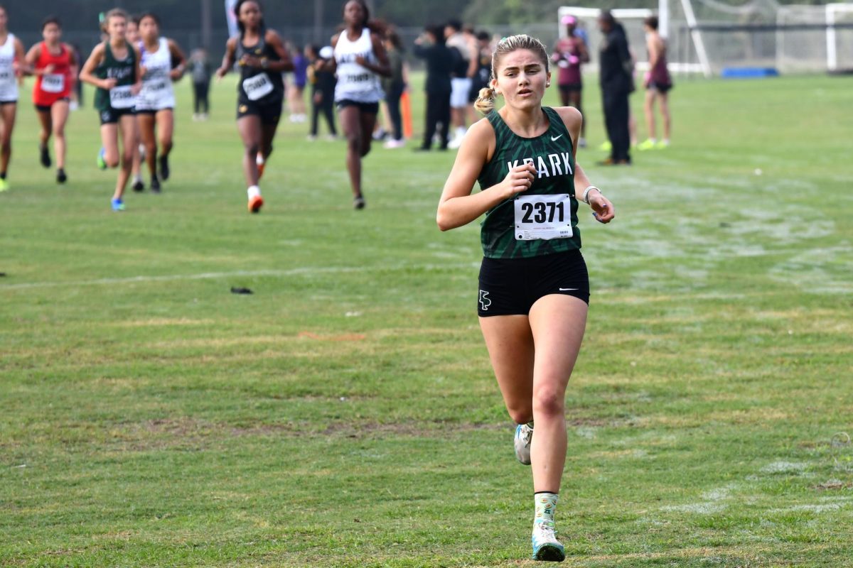 Senior Lucy Foltz competes in the 2023 District Championship at Atascocita High School. She will return to that course this Thursday to compete in her final district meet. “Lucy’s extremely talented," coach Cody Cook said. "She’s very gifted athletically. She’s very strong physically and mentally. But her greatest strength is that she is not afraid to push through any pain. She’s not afraid to hurt; and so as a cross country runner that’s the number one thing you need to be able to do, and she does that very well.”