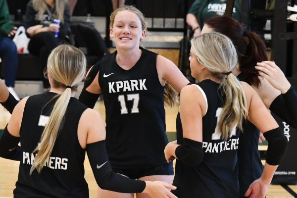 During a game against West Fork, senior Krisslyn Boyles celebrates a point with her team. During the match on Oct. 14, Boyles recorded her 1,000-career dig for Kingwood Park.