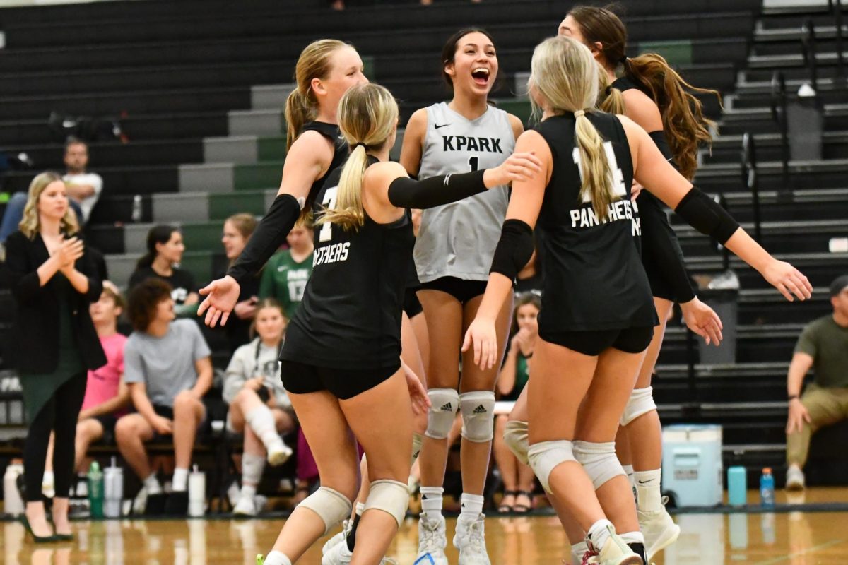 The team celebrates a point against Splendora on Oct. 29. The Panthers won 3-2 on Senior Night.