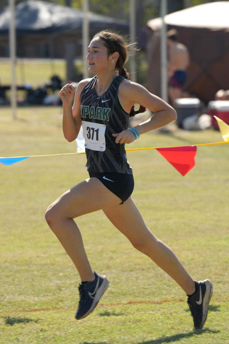 Junior Maria Maldonado competes in the JV 2 mile race at the District Championships on Oct. 10. She finished 23rd in a time of 15:31.35.