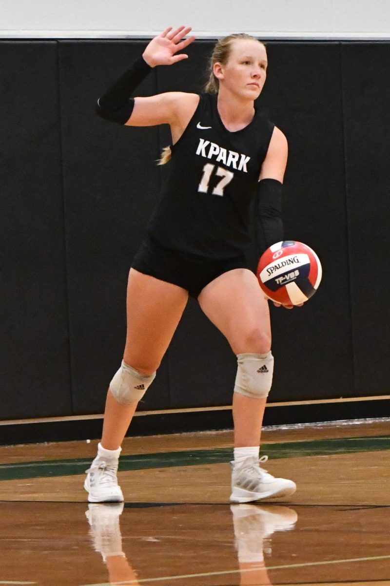 Senior Krisslyn Boyles serves a ball during a home match this season. She is a two-year team captain.