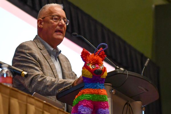 Retired assistant superintendent Trey Kraemer speaks about leadership and the importance of student journalism during the Award Ceremony at the TAJE Fall Fiesta, where he was honored as Administrator of the Year.