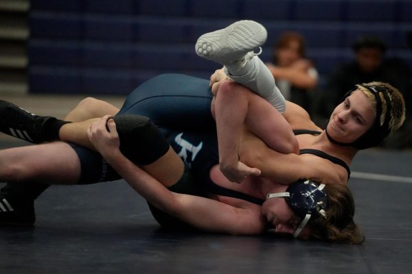 Wrestlers open season with meet against Kingwood