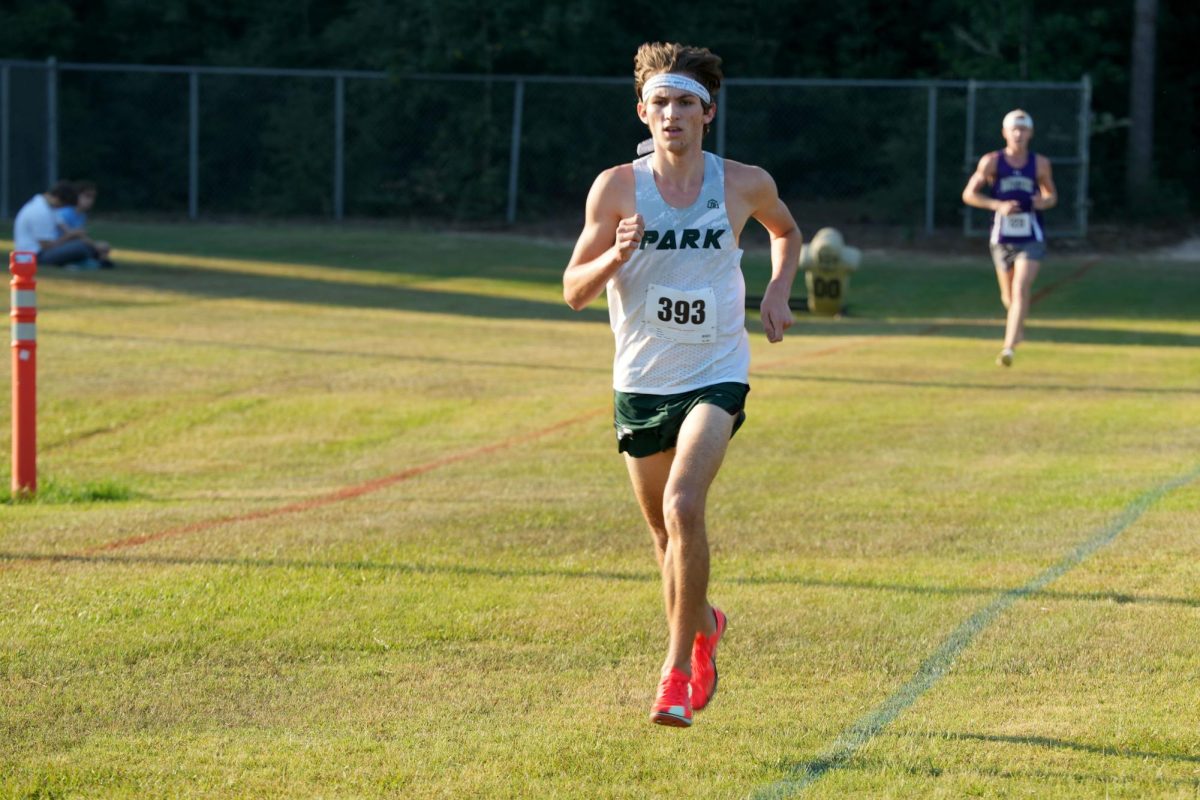 Elijah Merino, senior, competes in the district cross country meet. He finished No. 8 in the state at the UIL 5A State Cross Country Championships on Nov. 1. He also signed a letter of intent to run cross country at Sam Houston State next fall. 