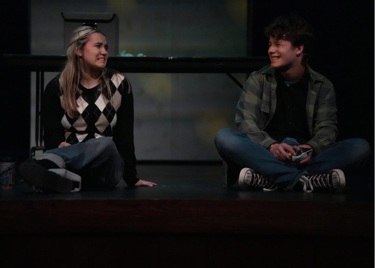 Clara Brandt and Mike Clark, played by Emerson Harris and Sam Lewton, painfully laugh on their date.