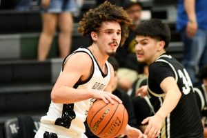 Brad Garcia, a first-team all-district player from a year ago, drives to the hoop. He is a senior leader on this year's squad.