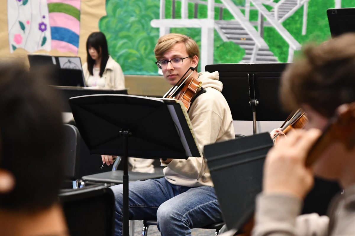 Senior Lucas Pagano practices during fourth period orchestra class. 