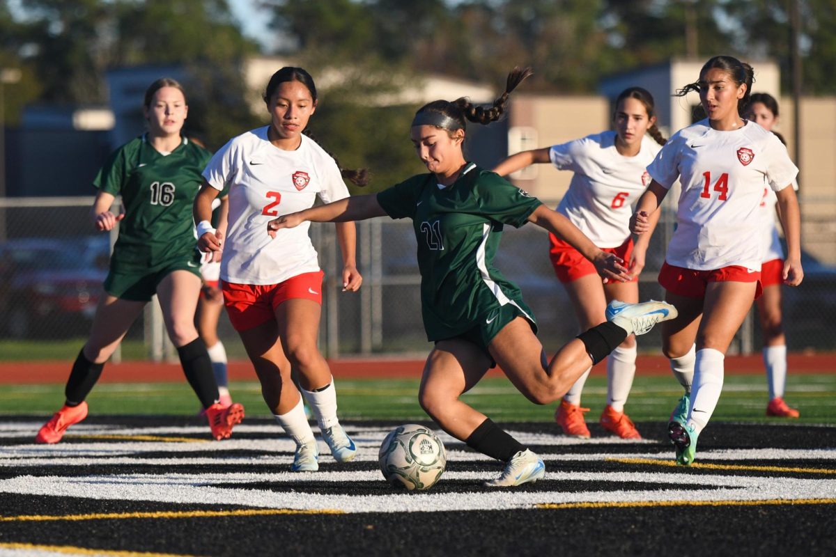 Freshman forward Liani Villegas takes a shot near the goal against North Shore.