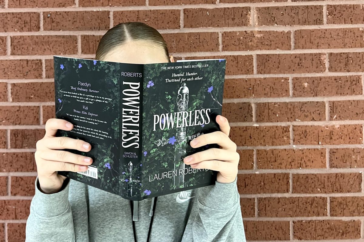 The "Powerless" book is the first in a trilogy by Lauren Roberts.