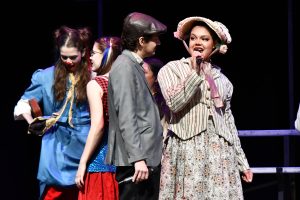 Junior Amara Amadi performs a song with junior Viktor Cruz from "Barnum" during lunch on Jan. 23. The cast did two songs from the show to help encourage students and staff to buy tickets. "Barnum" runs from Jan. 23-26. 