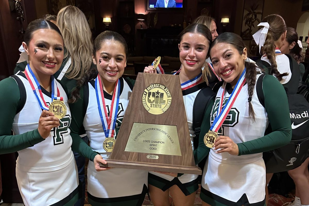 Cheerleaders Riley Dougherty, Maddy Miranda, Haley Tappen and Haylee Palomarez pose with their first place trophy after winning the UIL Spirit COED State Championship. Photo courtesy of Brittni Sharp.