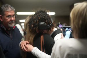 Senior Brad Garcia embraces his mother after he plays his final game of high school basketball. The Panthers lost to Montgomery, 65-61, in the first round of the playoffs.