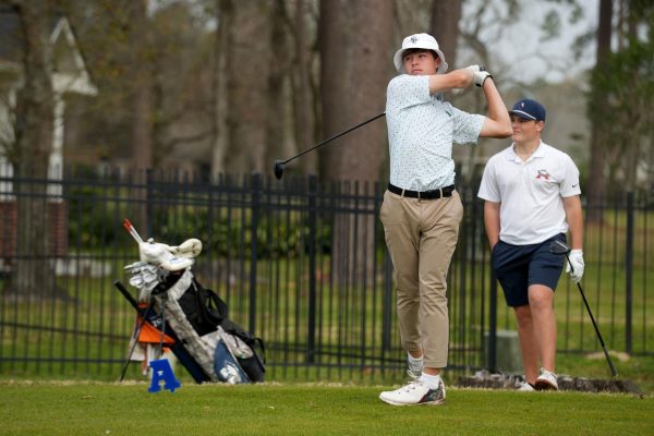 Junior Cory Case tees off during the Atascocita Varsity Shootout on March 7. He defended his title from a year ago and helped lift the team to a third place finish amongst 6A schools.