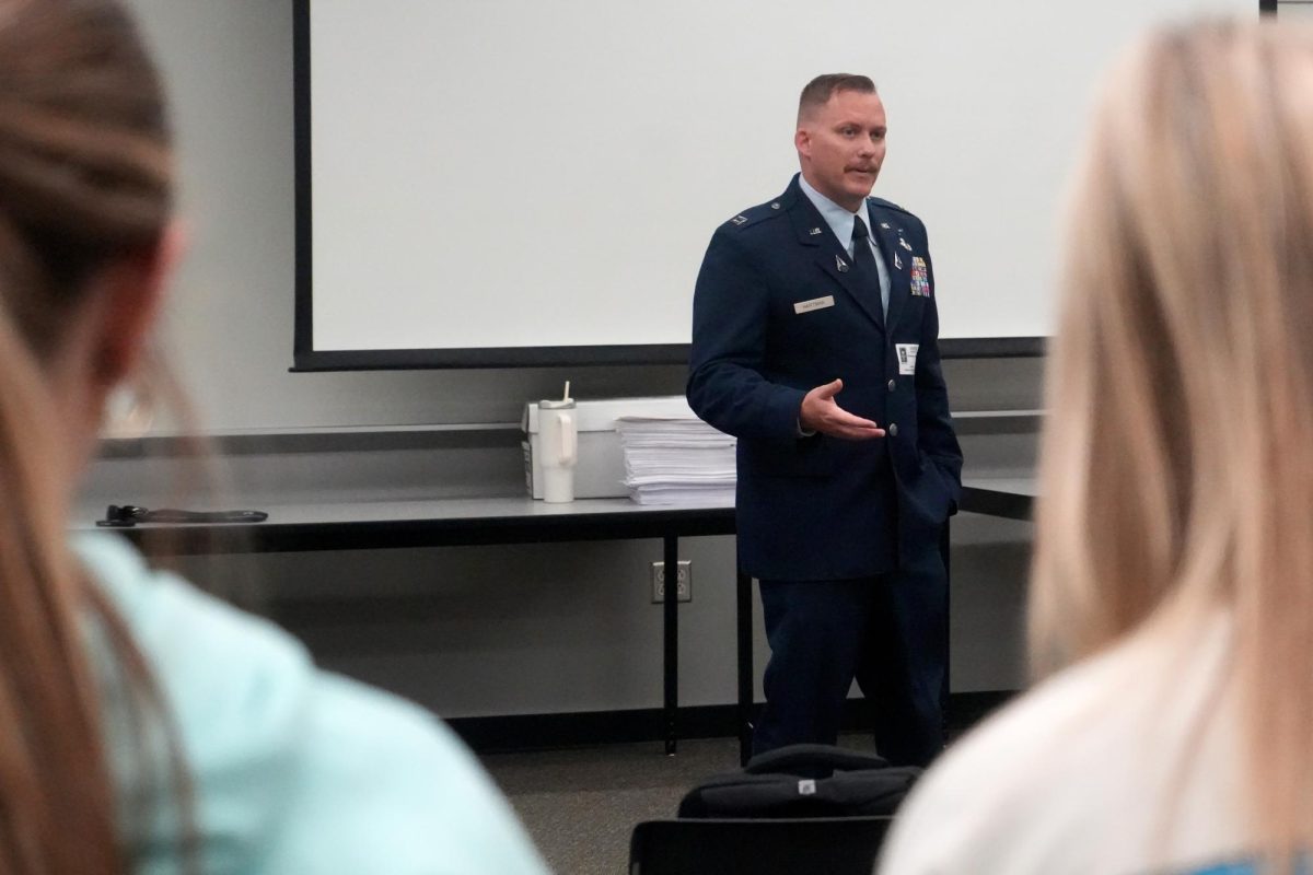 Captain Blake Hartman talks with students on Aug. 20 about his career path in the military after graduating from Kingwood Park in 2010. He now works for the United States Space Force. 