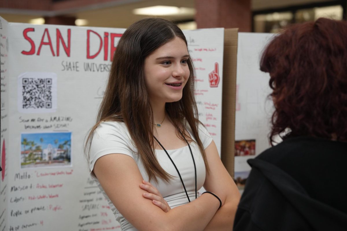 Sophomore Josephine Dethloff talks with peers during Flex Hour about an AVID presentation about San Diego State University in May 2025.