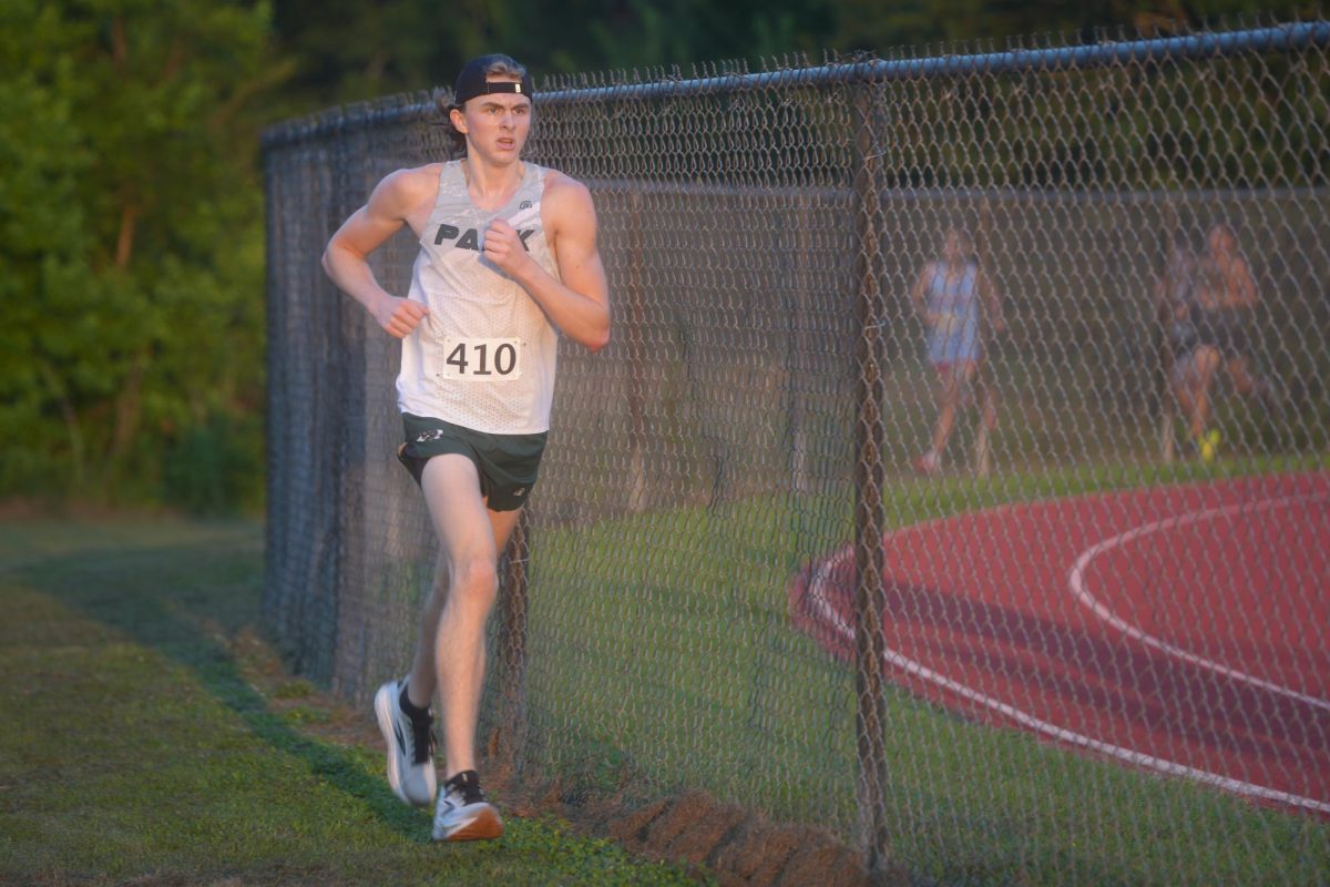 Senior Jennings Barndt competes in a preseason cross country meet at Creekwood Middle School in August. Barndt broke his ankle last season and is working to stay healthy to help the team this year.