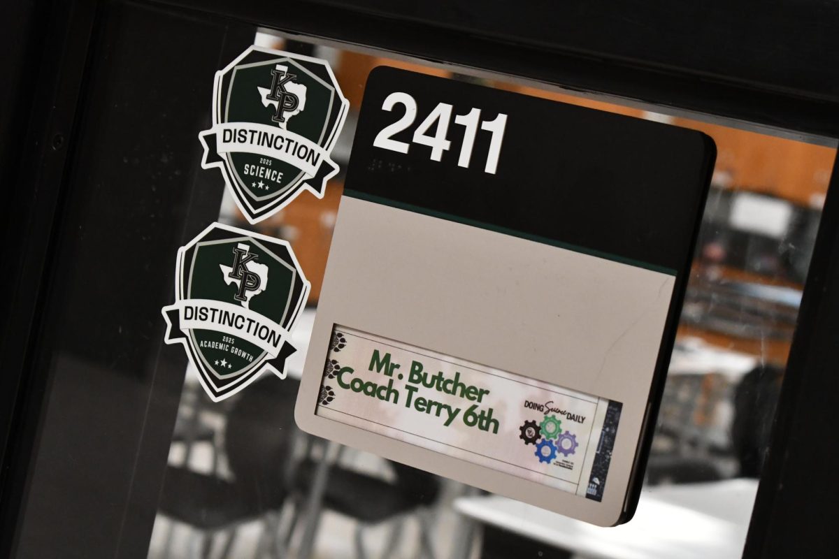 Science classrooms, like Jacob Butcher's, has both distinction stickers on the windows. Science classrooms received the science sticker, while all classrooms in the school received the academic growth sticker.