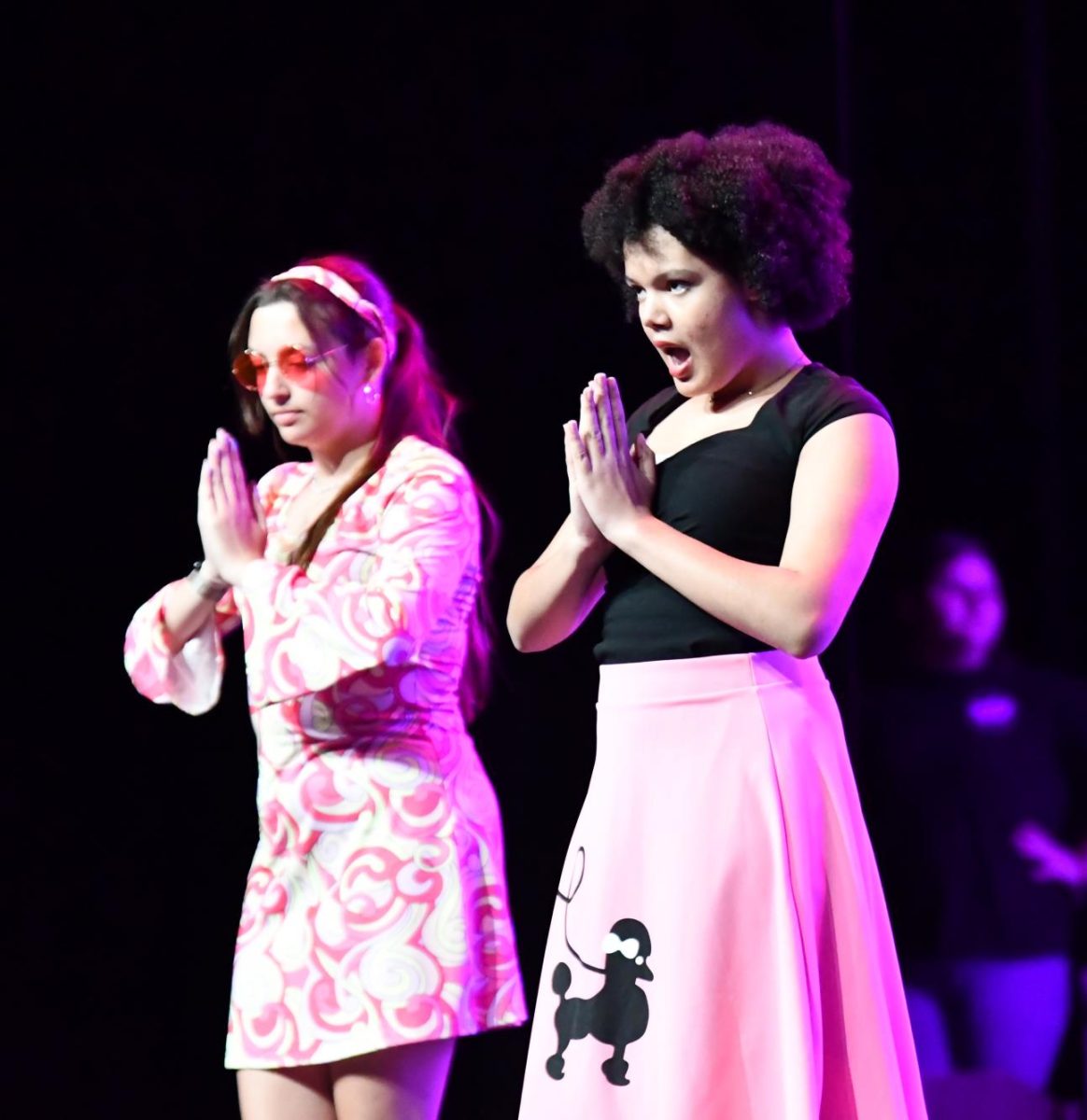 Seniors Sarah Orth and Amara Amadi perform in the fine arts’ annual lip sync competition on the stage during Flex Hour on May 15, 2024. 