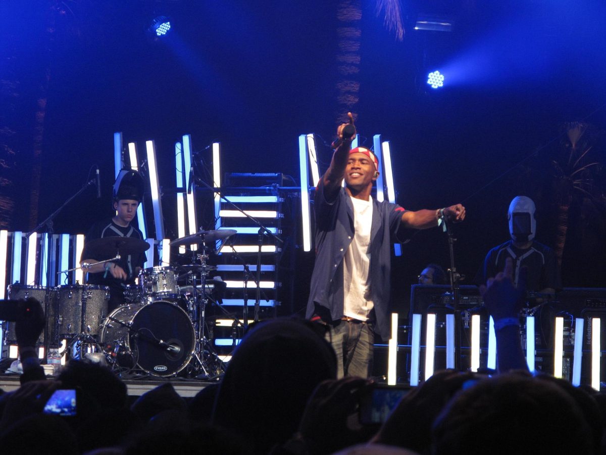 Frank Ocean holds out his microphone to the crowd while performing at Coachella 2012. Photo courtesy of David Hwang/Flickr/CC.