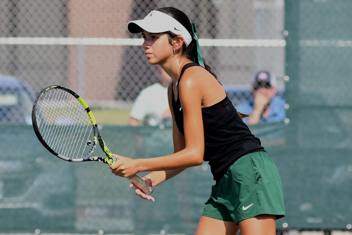 Junior team captain Scarlett Perez awaits a serve against Barbers Hill.