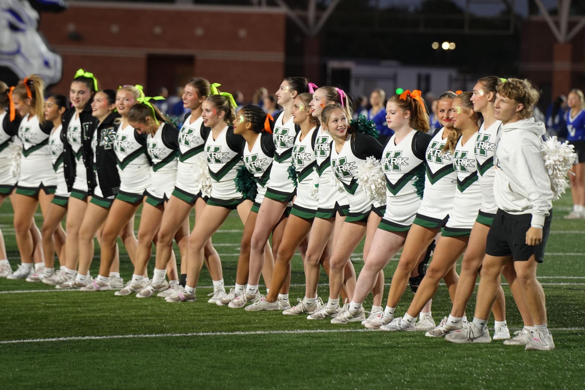 Cheerleaders line up before the football team is introduced prior to the team's home game against Friendswood.