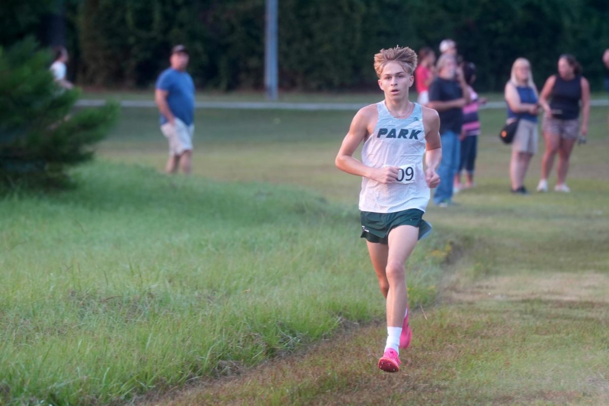 Sophomore Bo Barndt runs in a preseason meet at Creekwood Middle School. He finished 10th in the district meet as a freshman to help the boys finish second to Dayton. 