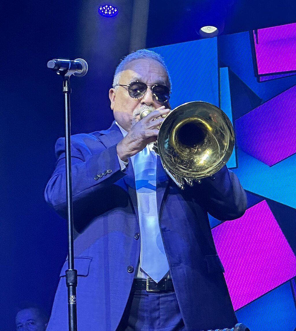 Willie Colón performs at 713 Music Hall in Houston in March 2023. Photo credit: MerleEllaPatsy, CC BY-SA 4.0 via Wikimedia Commons.