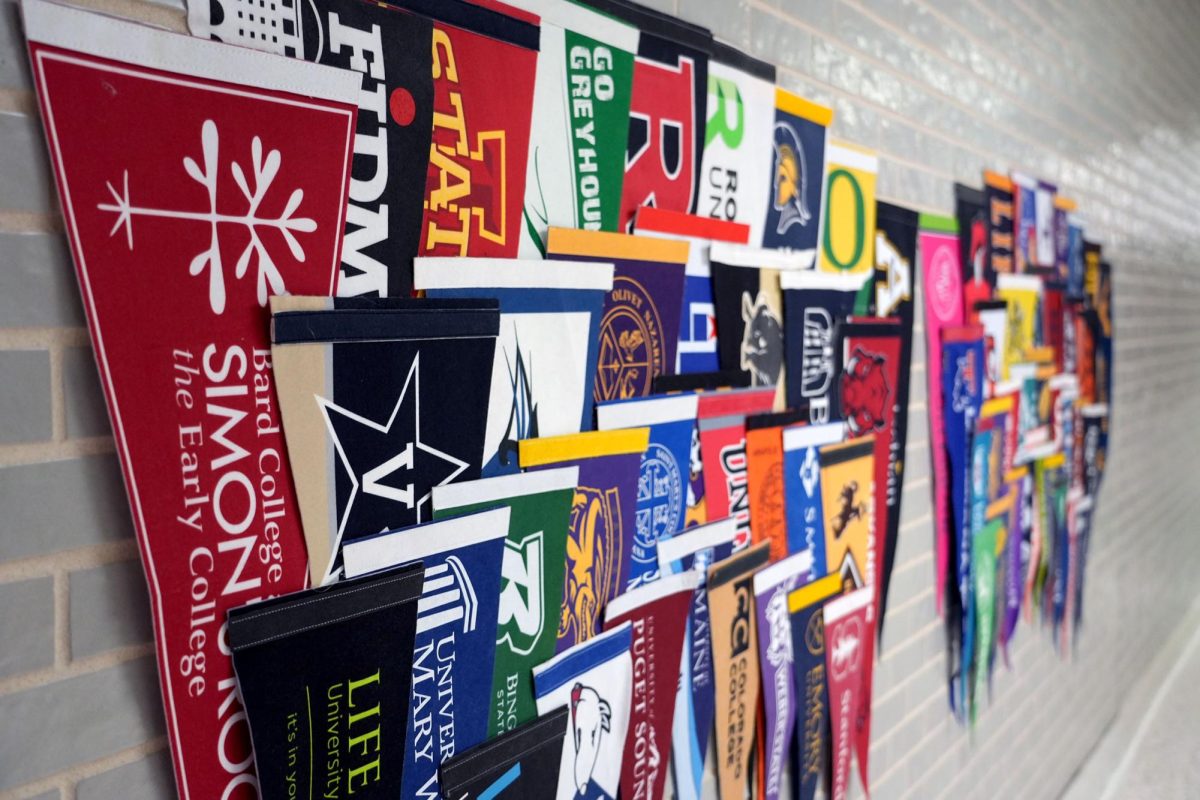 College pennants hang in the halls throughout the school.