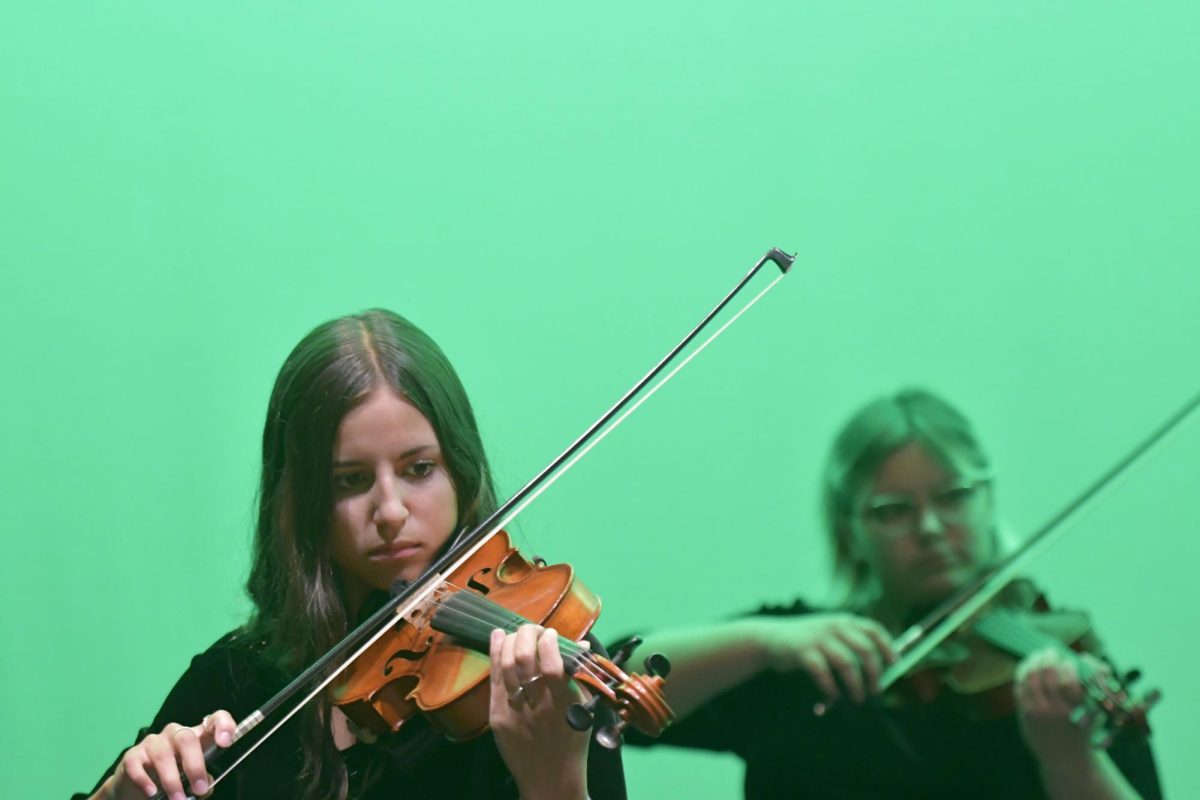 Junior violinist Amerie West performs in the beginner orchestra concert in September. She is an accomplished bassist in the chamber orchestra.