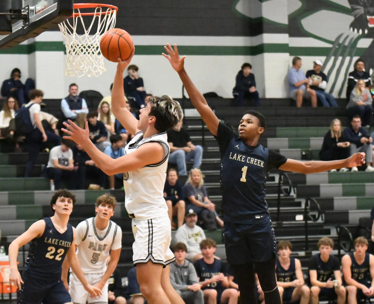 Junior Trey Nicholds goes up for a shot against Lake Creek on Nov. 25.