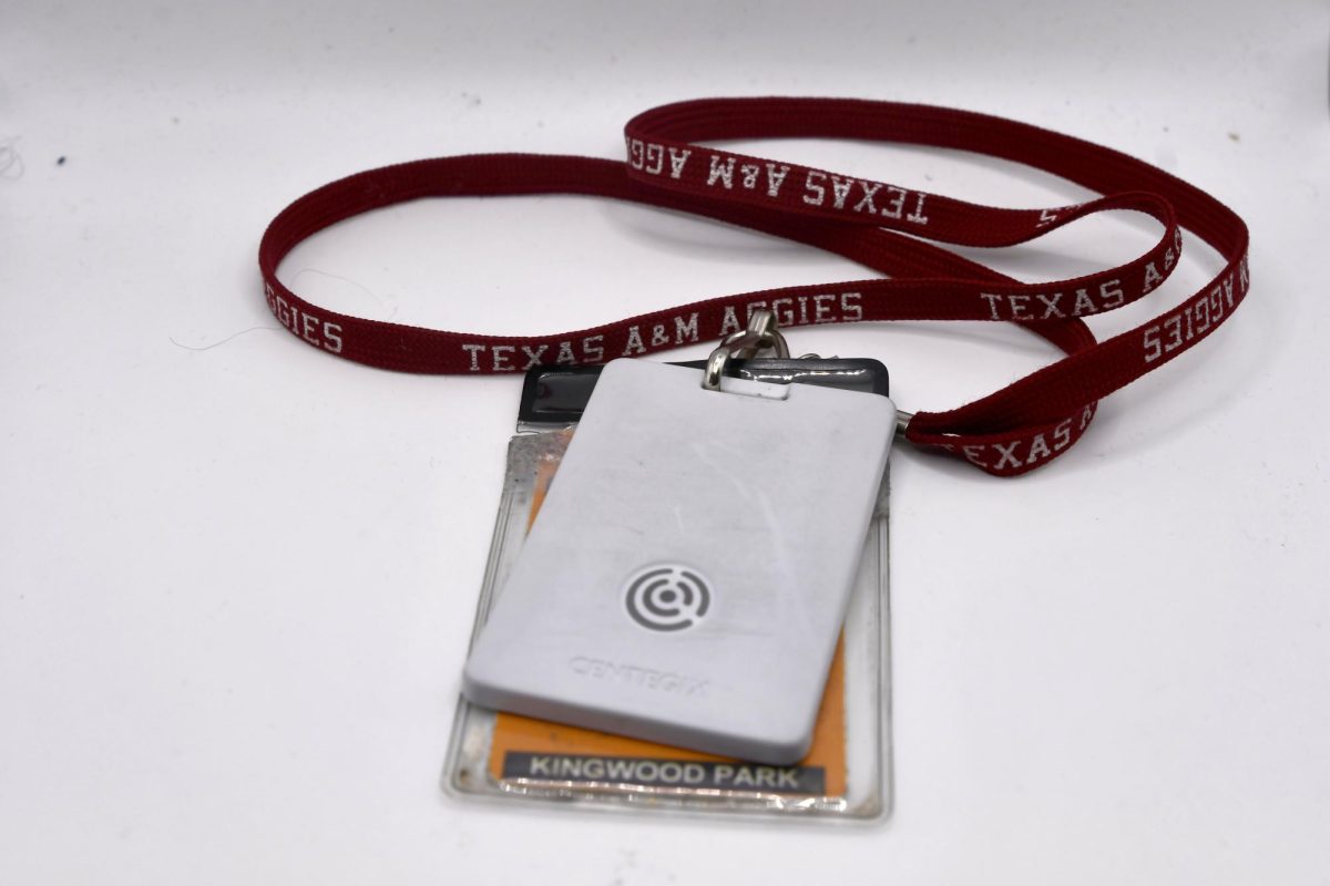 Teachers are required to wear IDs each day at school. The new addition to their badges includes a button to press in emergency situations. 