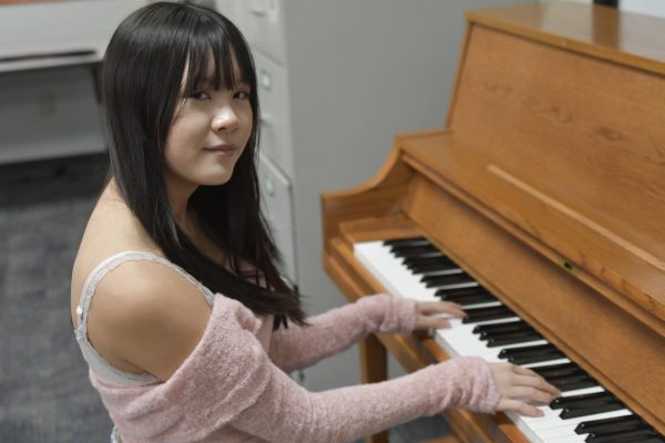 Senior Emily Le plays piano for the orchestra. She was a solo pianist for "Sweeney Todd" last month.