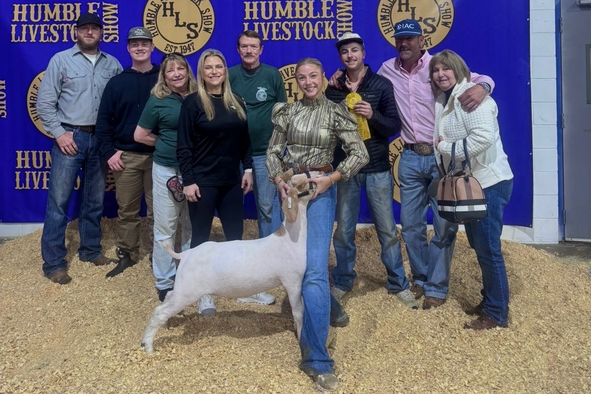 Junior Allie Talley celebrates after finishing fifth overall with her goat at this year's Humble Livestock Show. Photo courtesy of Allie Talley.