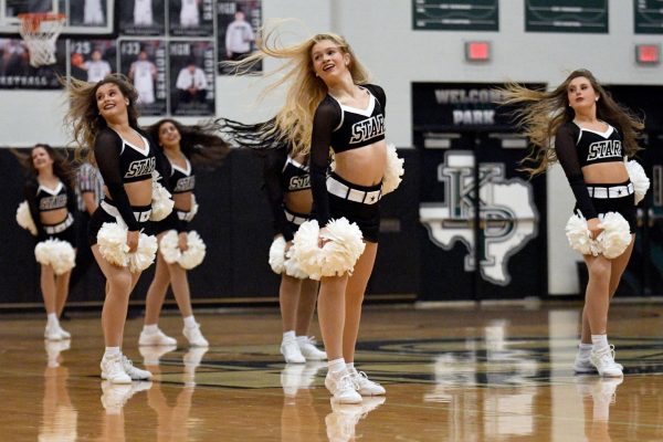 The Silver Stars perform during the boys basketball against Alief Hastings in December. The dance team won Overall State Grand Champion honors at their competition in February. 
