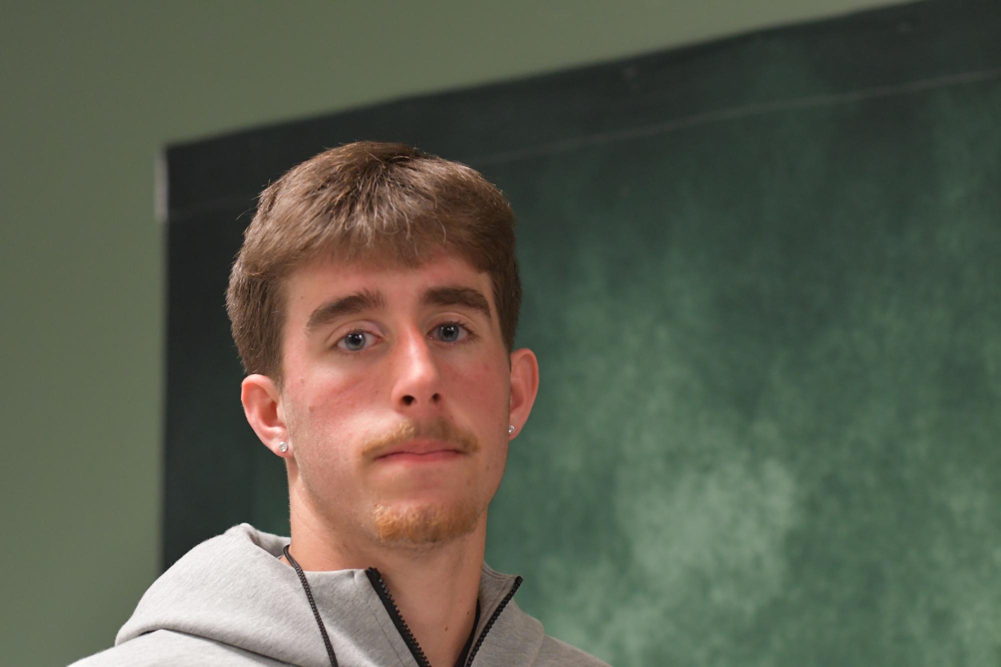 Senior Jayden Hanson wears earrings after deciding to pierce his ears about a year ago.