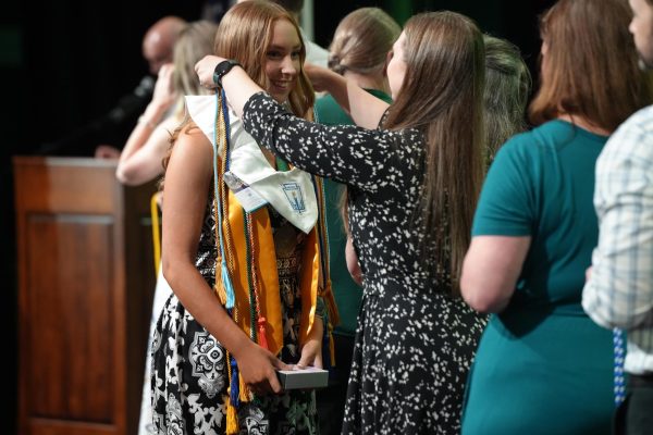 Senior Annaleise Kimmel receives her cords on Honors Night. Kimmel finished second in her class.