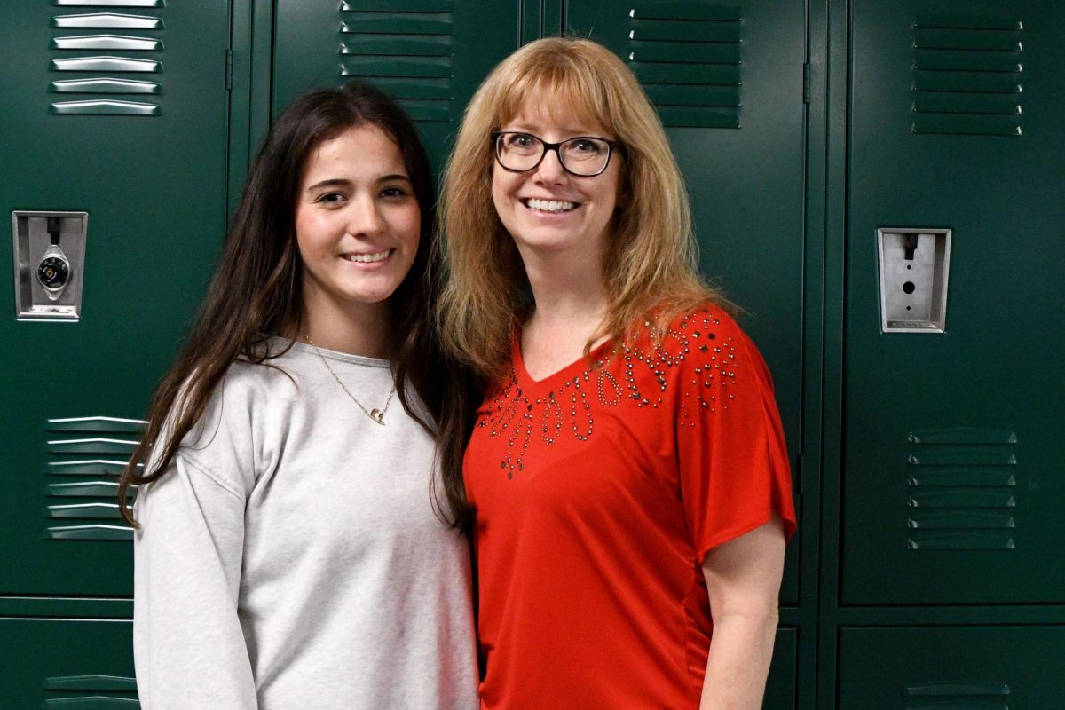 Junior Pilar Ratamales still talks with English teacher Michelle Neel in the hallways after being in her classroom during her freshman and sophomore years.