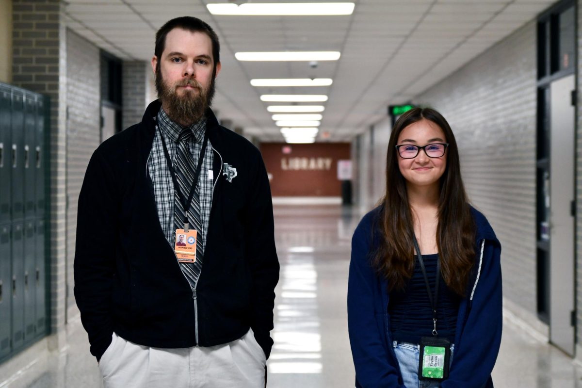 Geometry Steven Hewitt teaches freshman Taylor Green in first period Advanced Geometry. 