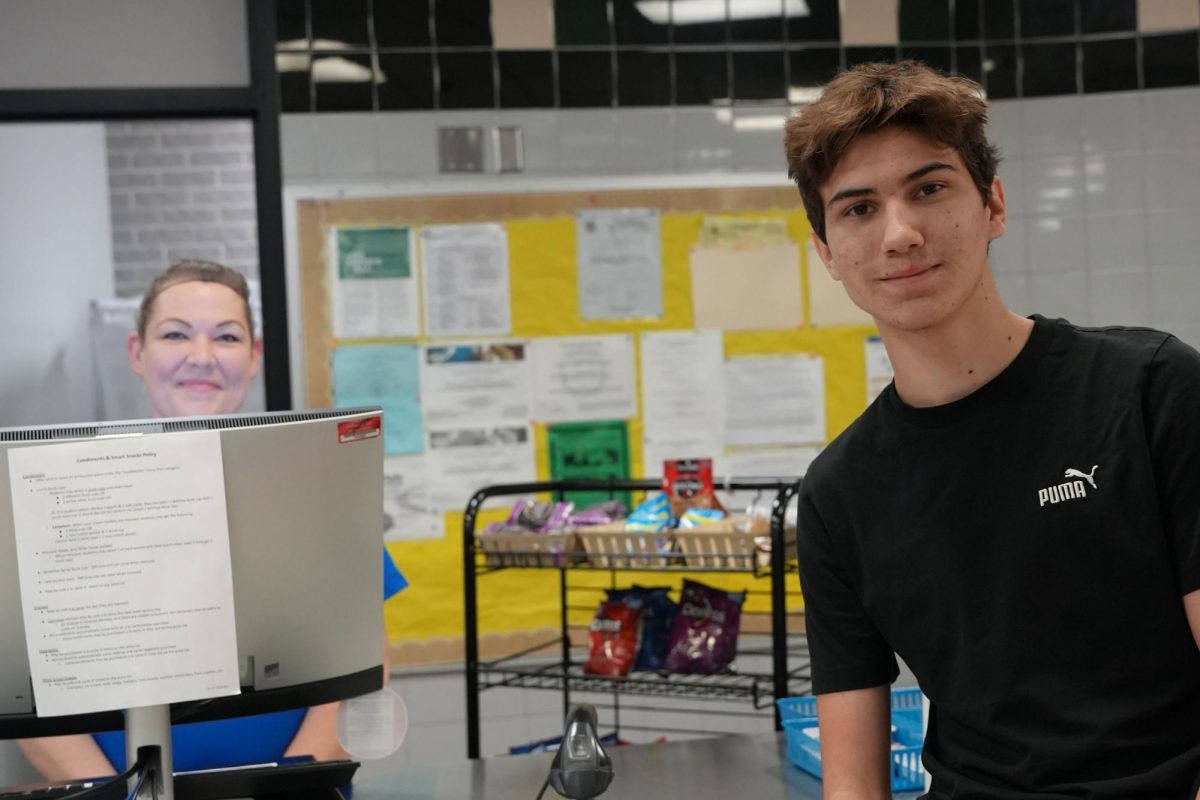 Freshman Josh Harris enjoys visiting with cafeteria worker Tabetha Bakke during lunch each day.